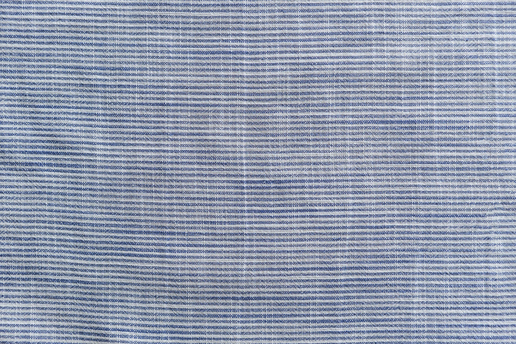 Chambray Linen wallpaper in soft blue and white weave