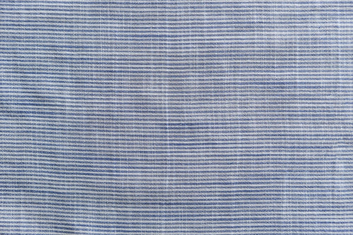 Chambray Linen wallpaper in soft blue and white weave