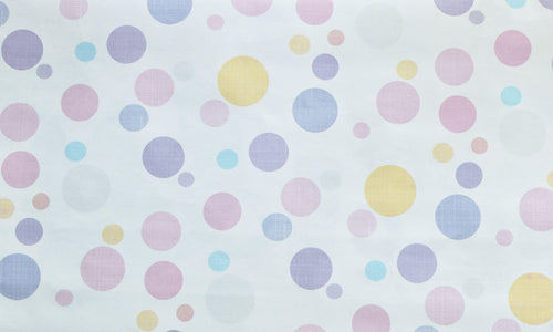 Bubble Pop wallpaper with soft pastel dots on a white ground