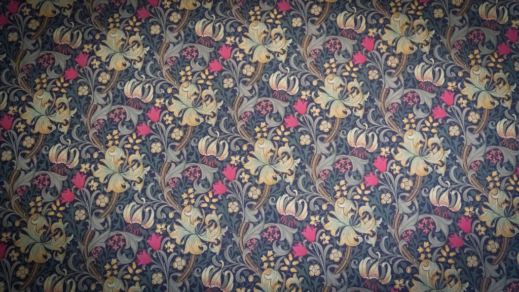 Morris Bloom wallpaper with vintage florals on deep navy