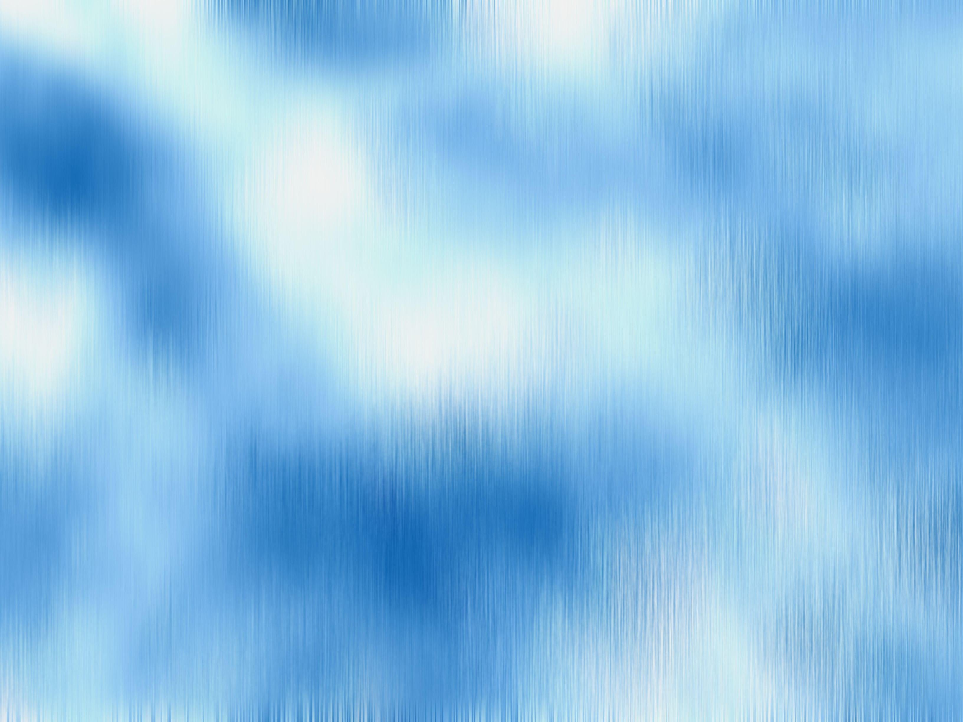 Sky Wash wallpaper with soft blue watercolour