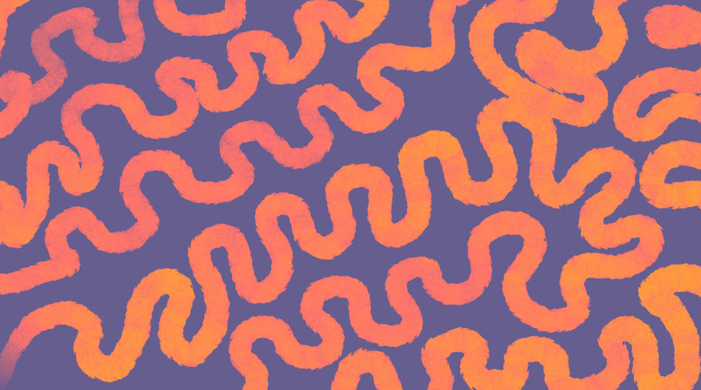 Squiggle Pop wallpaper with coral squiggles on purple