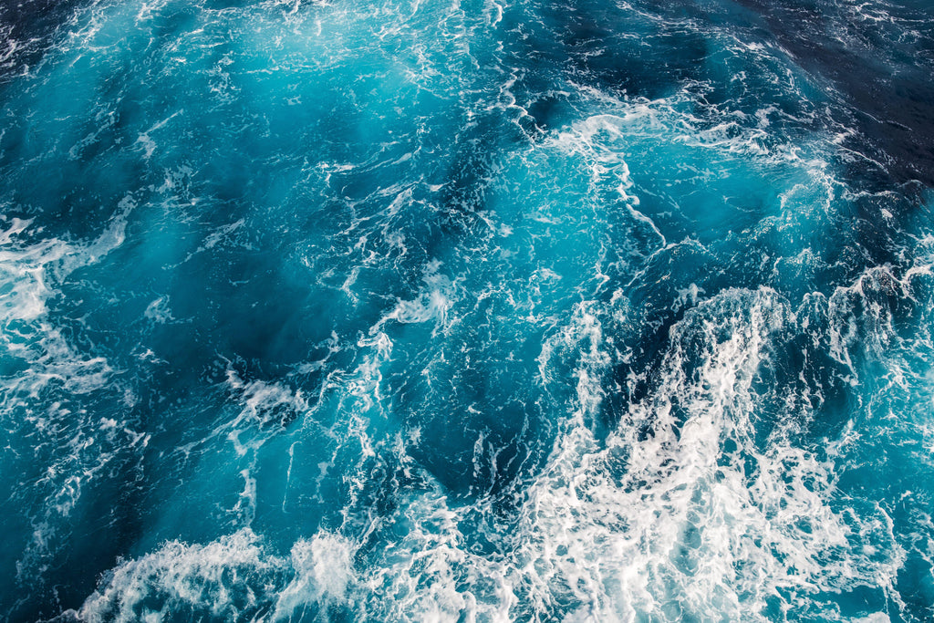 Ocean Surge, peel and stick wallpaper, dramatic ocean wave wallpaper featuring swirling turquoise water and foamy white