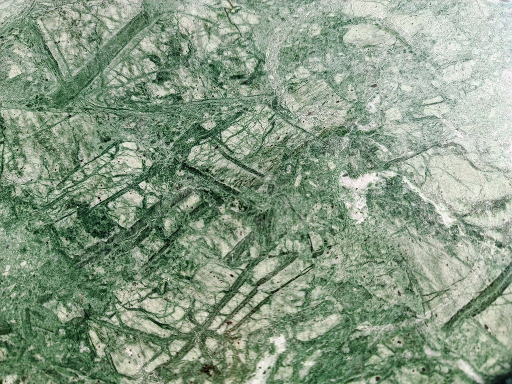 Verdant Marble, peel and stick wallpaper, rich stone textures and natural veining create a bold organic statement