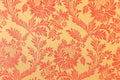 Amber Damask wallpaper in coral and orange on peach