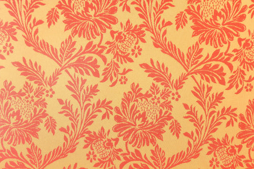 Amber Damask wallpaper in coral and orange on peach