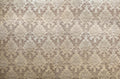 Antique Damask wallpaper in taupe and gold
