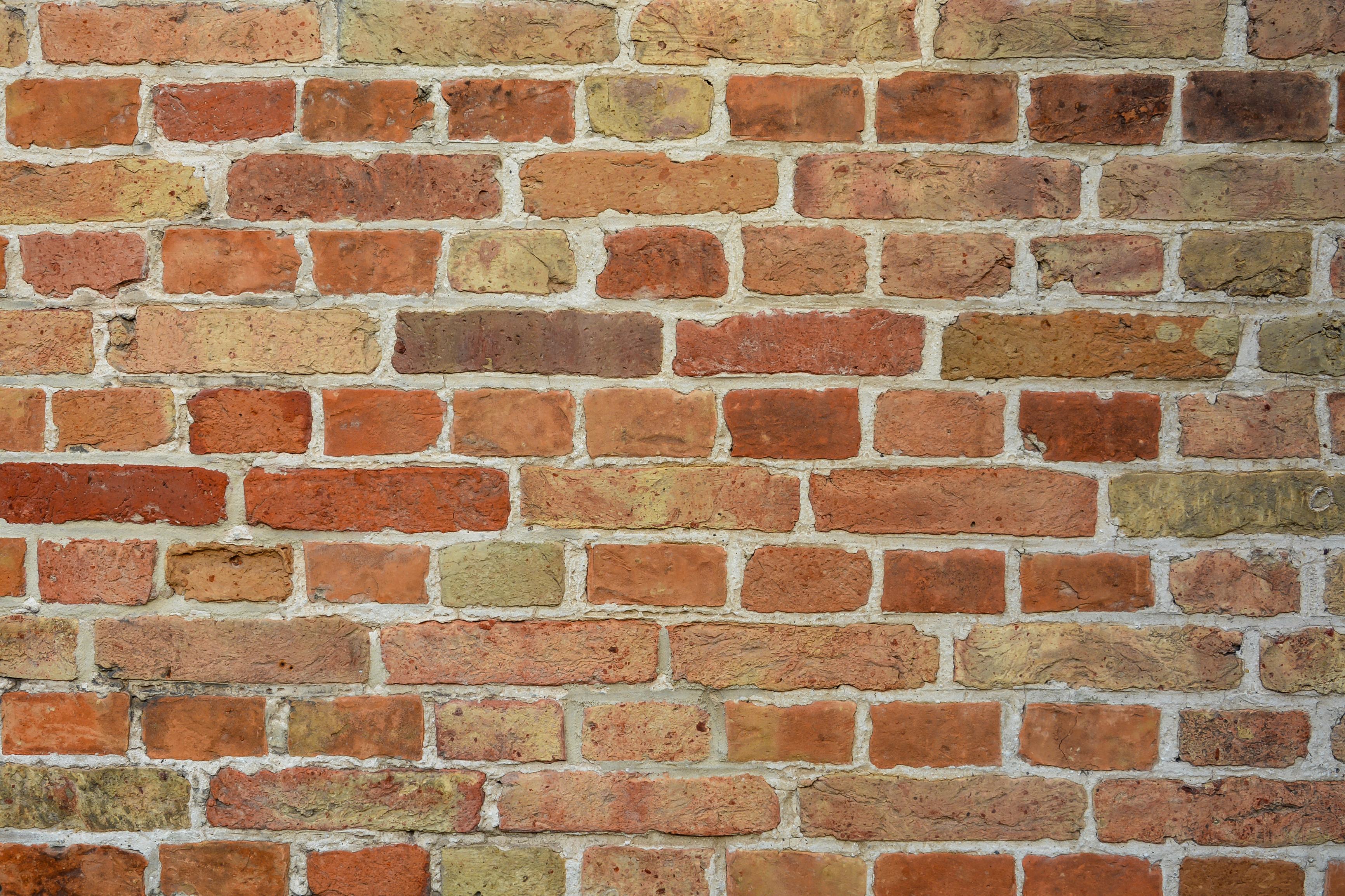 Red Brick wallpaper with exposed red brick wall