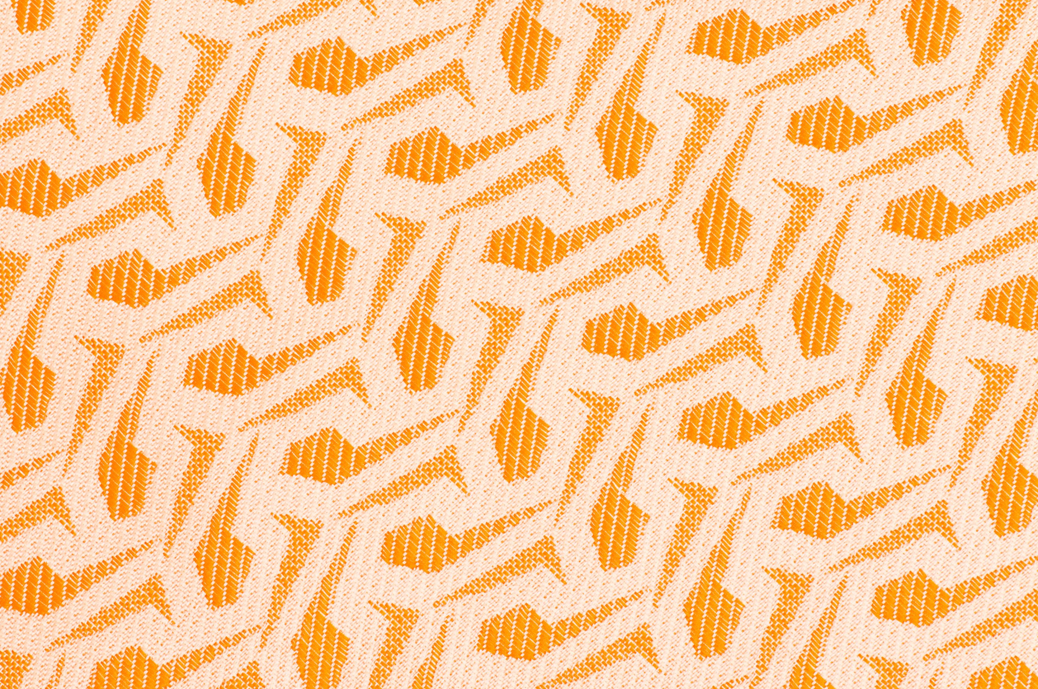 Amber Puzzle wallpaper with orange interlocking shapes