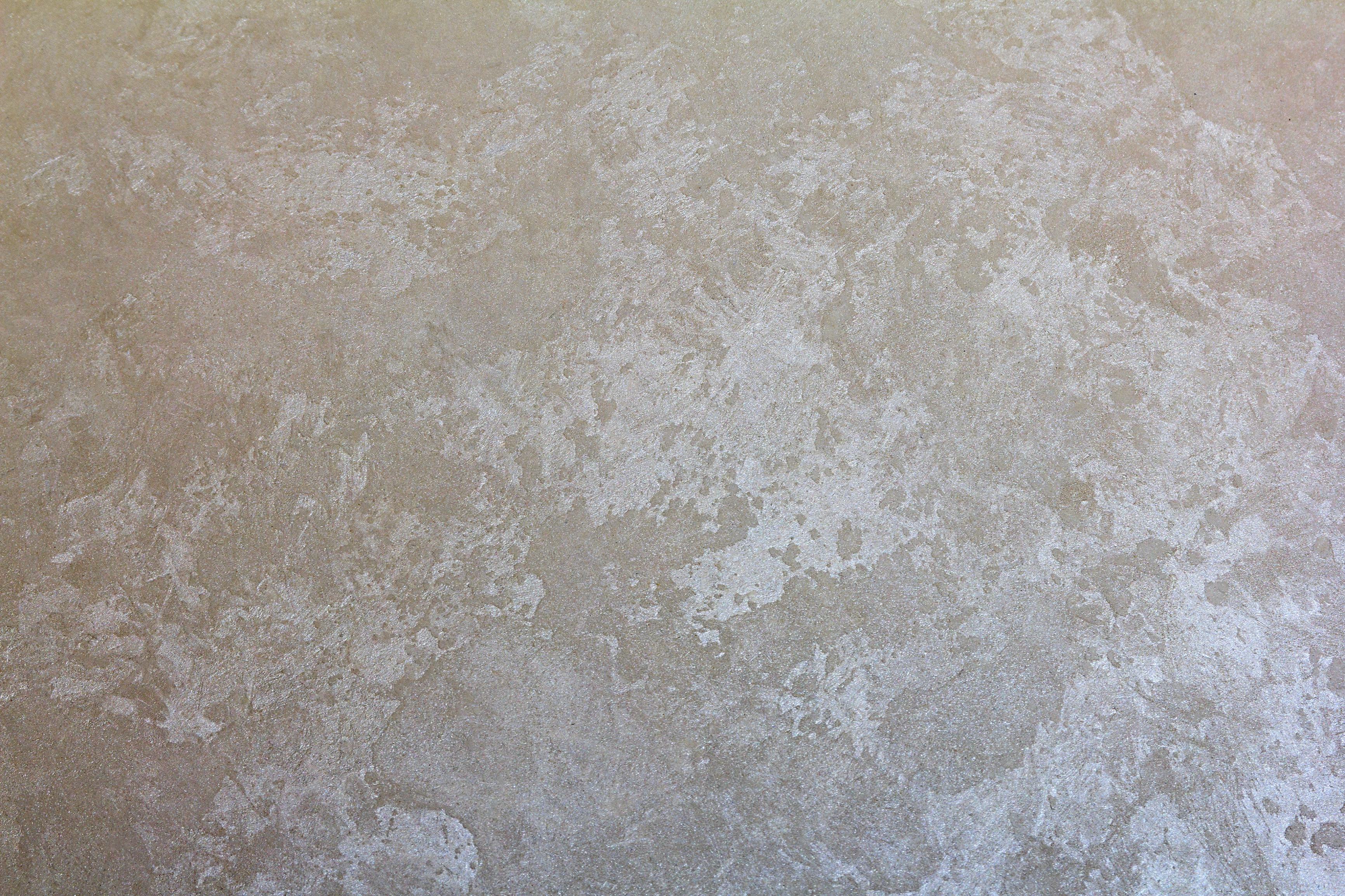 Weathered Plaster wallpaper in aged taupe and grey