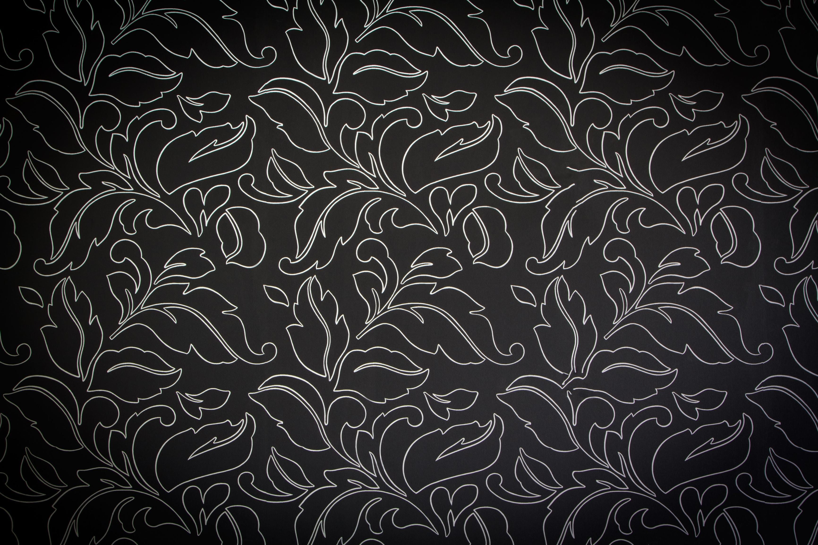 Noir Damask wallpaper with silver floral tracery on black