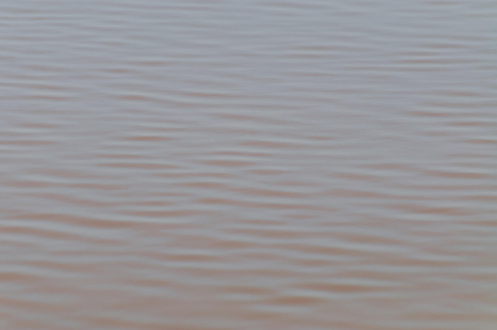 Drifted Silk, peel and stick wallpaper, soft horizontal ripples flow gently across a muted surface, evoking the calm