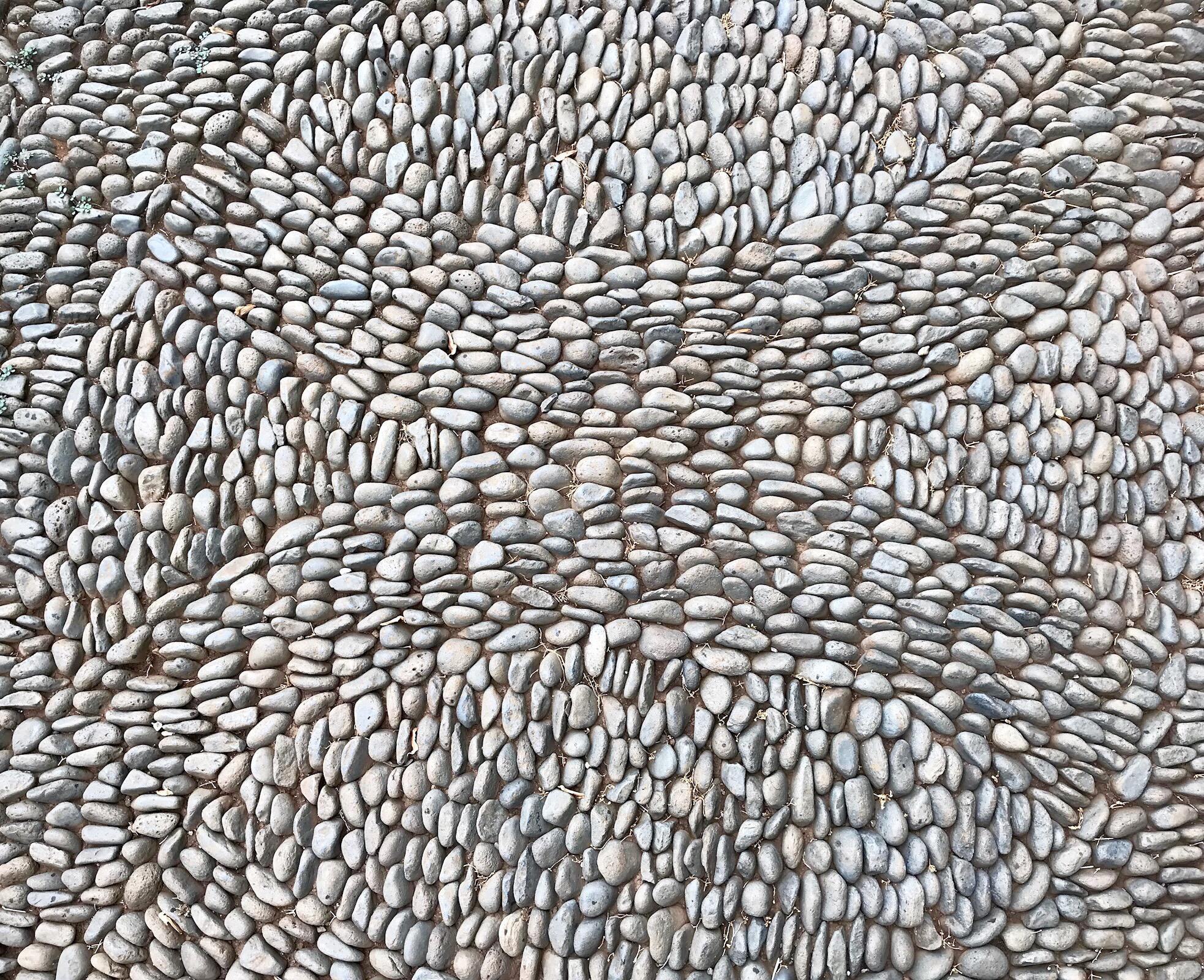 Pebble Mosaic wallpaper with grey and cream pebbles