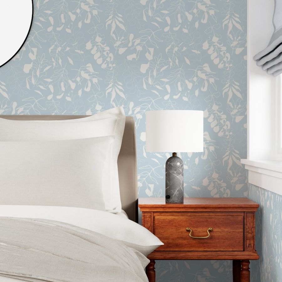 Gum Leaves in Light Blue by De-Anne Strange, peel and stick wallpaper styled in a room