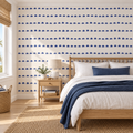 Navy Pebbles peel and stick wallpaper styled on a feature wall