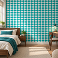 Teal Harlequin peel and stick wallpaper styled on a feature wall