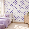 Violet Dots peel and stick wallpaper styled on a feature wall